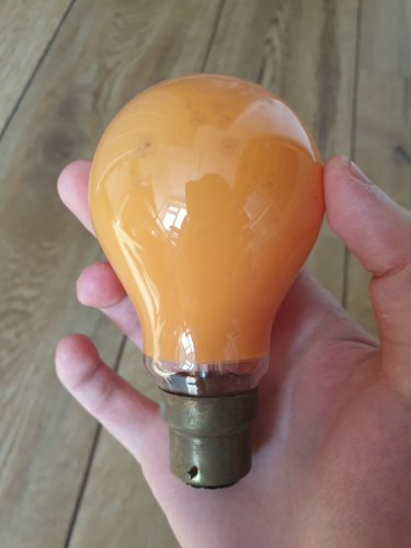 Mazda 60W orange coloured GLS incandescent bulb 
From car boot sale
