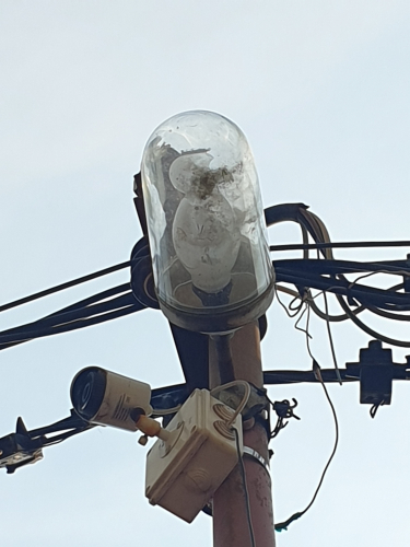 Another angle of that busted SON-E or MV bulb in capsule shaped fixture
Some building I passed by whilst on the walk to Perast town had this cool looking fixture with a SON-E bulb that was busted 
