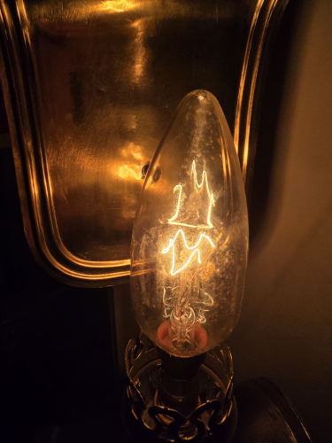 Osmay clear 40W candle bulb lit up
Lovely zig zag filament 
