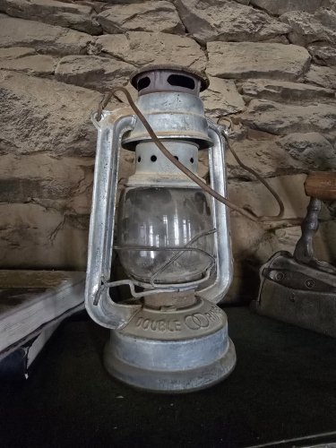 Hurricane oil lantern (looks original) 
At Sioux City theme park, Maspalomas area of Gran Canaria 

This was on the display at the so called "jail of Sioux City" 

