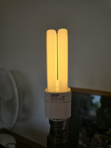 Philips stick 11W CFL lit up 
Here is the stick (PL Electronic C) 11W CFL lit up
