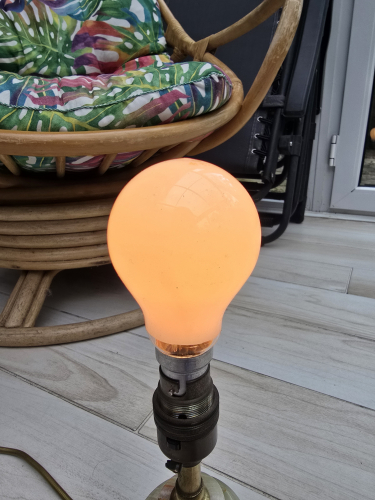 Wilko 12W GLS incandescent bulb lit up
This one is from the packaging with the vector design 

The etch although faint is the yellow stamped design 
