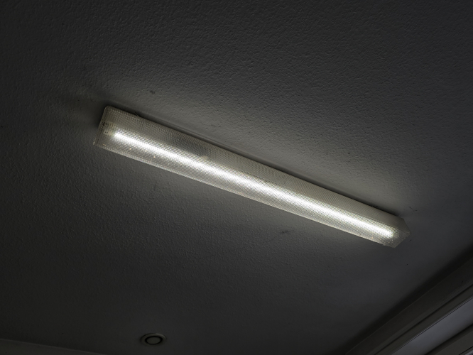 Crystal fluorescent fixture 
Spotted in the men's bathroom at the hotel in Drei Annen Hohne 

This hotel was opposite the railway station for the Harz Mountains HSB narrow gauge railway 
