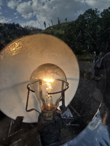 Incandescent GLS bulb on the steam train headlight 
Defo will be a low voltage GLS incandescent bulb 

Steam locomotive is 997245-6
