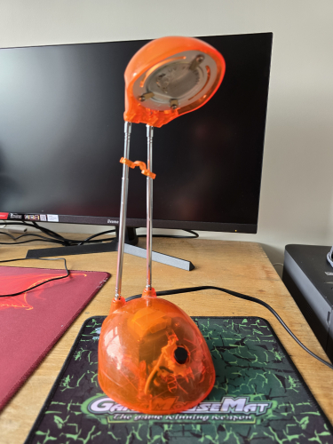 Transparent orange halogen desk light
Growing up I saw these type of halogen desk lights that use the 12V G4 halogen capsules 

Got this from car boot sale 2 days ago but unfortunately it doesn't seem to work. I guess it is the plug fuse 
