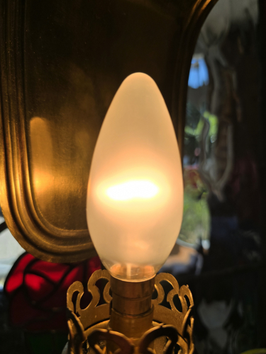 Erlectrik 60W SBC candle bulb
Here it is lit up

You don't see much of pearl/acid etch finish candle bulbs compared to opal, clear and even fumed silica 
