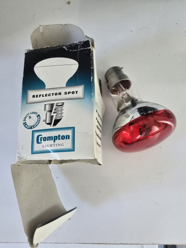 Crompton red coloured reflector incandescent 
At my Aunts house 

It has a B22 cap
