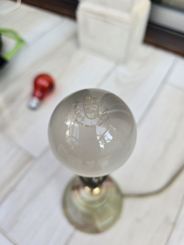 Philips 60W GB made GLS
Looks very blackened but still works - it's not vacuum filled cos it did feel very hot to the touch that I had to wait 4 mins to let it cool down 

Got it today at the car boot sale 
