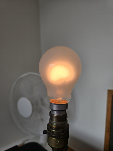 BHS 8W GLS incandescent 
Got it from car boot sale and it was unpackaged 

Not sure who made it for BHS but with J6 code I think it is Philips 
