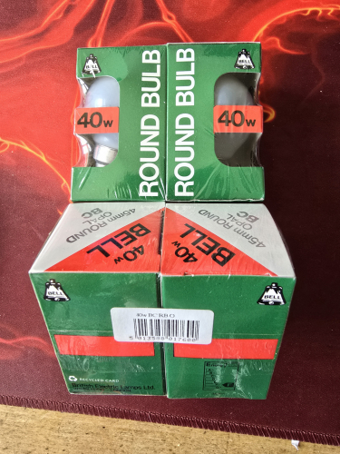 BELL 40W round/gold ball incandescents
Still sealed in the film wrap 

