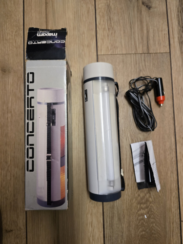 Concerto (Maxim) multi light source torch in one 
Got this from Sunday car boot sale 

It has an incandescent front, a fluorescent side and of course the red n yellow warning lights plus it has a siren built in too

It uses the power of a 12v car charger 
