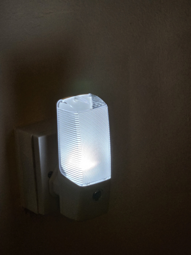 Arlec LED nightlight in action
Here it is in use 

The glow is more of a silvery blue rather than a ghostly icy blue 
