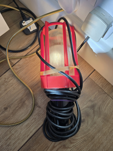 Worklight (lit up)
Picked up this worklight from the car boot sale in Thatcham

I got a total of 3 of this same design - inside it has a Superlite 60W incandescent 

Here it is lit up
