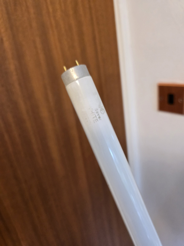 Ring 36W Energy Saver 
Both of the 36W Ring Lighting 46060 fluorescent fixtures came with this Energy Saver Ring branded tube  
