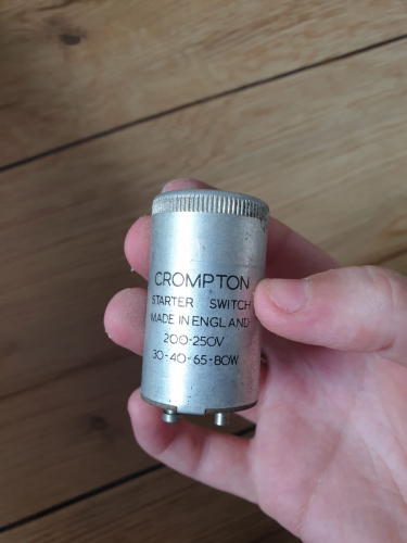 Crompton 4 pin metallic starter 
10 years ago I was told about the very rare fluorescent starters that had 4 pins instead of the 2 we have today

This morning at the car boot sale I picked up a box full of starters and seeing that it had these 2 Crompton 4 pin metallic starters that would be used for 30-40-65-80W fluorescent fittings - I just had to get them

These will be handy for if I ever come across a fluorescent fitting that uses 4 pin starters

