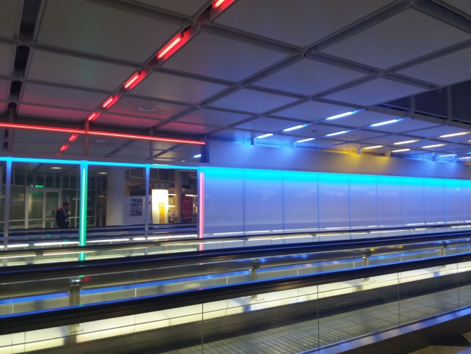 Coloured 18w tubes and neon at Munich Airport (1)
Seen in February! What a cool installation. The tubes seemed to be Philips made.
