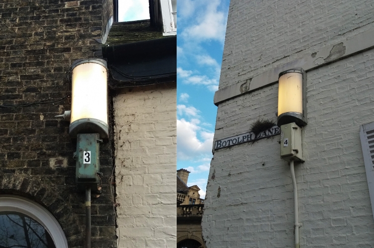 Very old fluorescent wall lanterns converted to PL lamps
These were converted during Cambridgeshire's street lighting upgrade years back. They used to run 2ft T12 tubes I think and now run PL lamps in 58w. The housings themselves are probably from the 50s! These have been known about for years by enthusiasts but who made these fittings has never been established.
