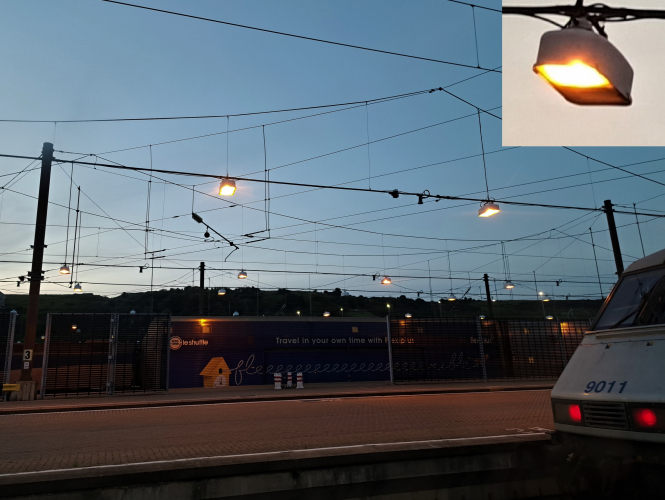 Catenary HPS fittings at the Eurotunnel
I always see these year on year when me and my family go on holiday to France, nice to see they still remain but for how much longer is anyone's guess. A few fittings have already been casually replaced by LEDs.
