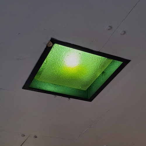 Old and dim mercury lamp at a train station
Under the eaves of a seating area in Baldock station (UK) lies this old mercury lamp still going strong, although it has certainly seen better days...
