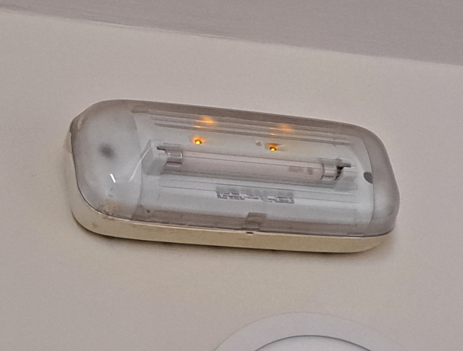 Typical Spanish fluorescent emergency light fitting
Again, used to be very common and are becoming rarer by the minute sadly. I do like these with their little orange indicator lamps. Older versions had little low-voltage filament lamps as indicators.

