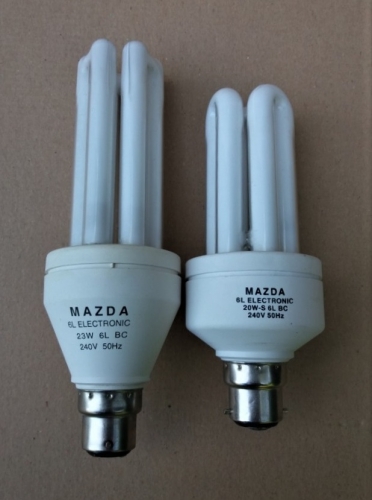 2 different Mazda branded CFLs
I think the lamp on the left is older. Both lamps were made under GE ownership.
