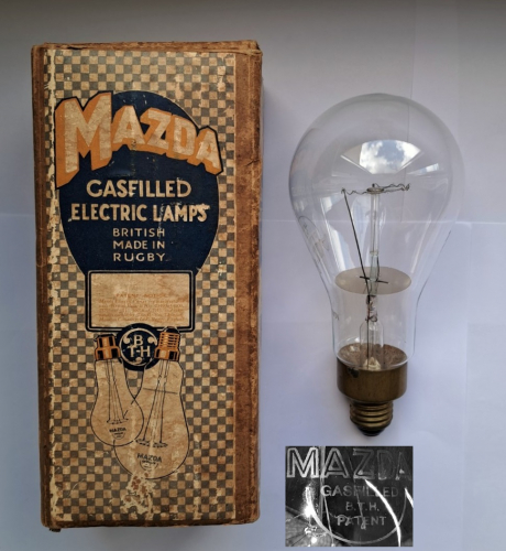 Mazda-BTH 200w lamp from the 1920's
This lovely old lamp was a recent Ebay find. It has a number of interesting features, including a heat deflecting disc (not often found on 200w lamps) and a lovely acid etch on the side of the lamp. The packaging is in pristine condition for its age!
