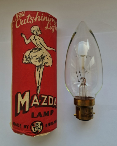 Mazda-BTH 40w large candle lamp
A very nice old candle lamp I found on Ebay not long ago, complete with lovely vintage wrapper in excellent condition. This lamp also has an interestingly-shaped filament.
