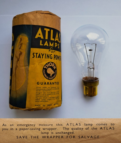 Atlas clear low-voltage filament lamp
Recent Ebay win - I'm not sure whether the lamp included in the wrapper is original - I would assume it is but any etch it ever had has unfortunately completely faded away. I also rather like the old notice on the wrapper regarding the WW2 paper rationing!
