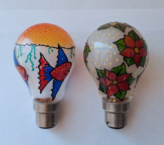 Unusual hand-painted GLS lamps
I've come across this sort of thing in the past, but not very often - these lamps are much nicer when unlit, and aren't as pretty as you'd expect when illuminated...
