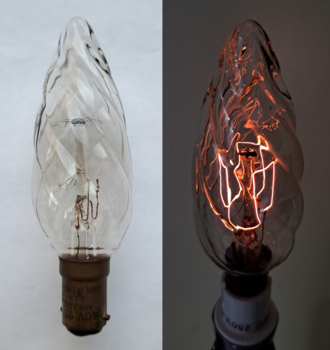 Mazda - BTH twisted candle lamp with elaborate filament
I originally wasn't going to upload this here, since I've featured photos of plenty of similar twisted candles here before. However, it is only when lighting this lamp that the differences become apparent. Instead of having the typical "linear" type of drawn filament, this lamp's filament resembles a square-wave pattern, and is rather eye-catching as a result.
