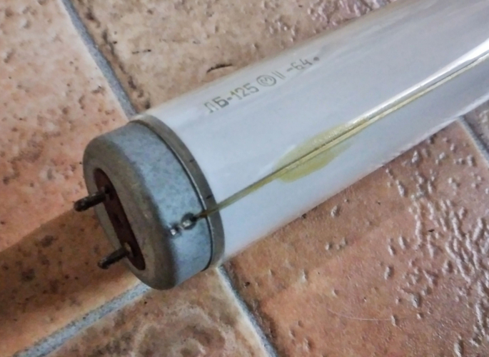 Old fluorescent lamp LB-125
Base, ignitor strip and stamp on the glass.
