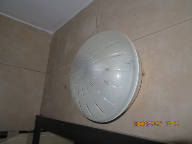 Another CFL explosion in my hostel
I wanted to turn on this fixture and the OMEGA branded CFL inside it, began to flicker horribly and after a few seconds it went out with a pop.
This is the second CFL that exploding in my hostel.
