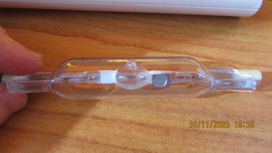 My second Aliexpress 70W 6500K MH lamp that I bought long time ago
[url=https://postimg.cc/TybwNndh][img]https://i.postimg.cc/TybwNndh/IMG-0921.jpg[/img][/url][url=https://postimg.cc/06SQX7kQ][img]https://i.postimg.cc/06SQX7kQ/IMG-0922.jpg[/img][/url][url=https://postimg.cc/21Myx0D8][img]https://i.postimg.cc/21Myx0D8/IMG-0943.jpg[/img][/url]
I don't remember how much I run it last time, but unlike the newer lamp, it have less reflective coatings, the electrodes aren't on the same location at the ends, and when new, the dysprosium emission was much brighter than what it is now.
