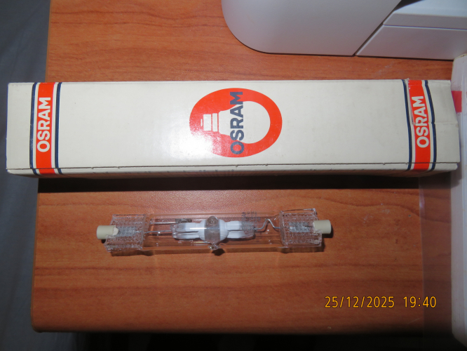 NOS Osram HQI-TS 70W/WDL pre-Excellence from 1988
[url=https://postimg.cc/hhYvmKjm][img]https://i.postimg.cc/hhYvmKjm/IMG-0986.jpg[/img][/url][url=https://postimg.cc/grjrrxYy][img]https://i.postimg.cc/grjrrxYy/IMG-0987.jpg[/img][/url][url=https://postimg.cc/yWGxR7dc][img]https://i.postimg.cc/yWGxR7dc/IMG-0988.jpg[/img][/url][url=https://postimg.cc/jC12fR5y][img]https://i.postimg.cc/jC12fR5y/IMG-0991.jpg[/img][/url]
I bought this lamp at eBay. Despite WDL, it have Sn-In-Tl-Na like the NDL one and unlike the single ended HQI-T 70W/WDL. There is also Li impurity.
Despite the presence of tin, the arc isn't diffused at all, which means that my Venture MH-DE 70W/UVS/PDX also have it, which is reasonable for the vapor afterglow when turning off the lamp.
What is strange, the electrodes looks different than that of my MH lamps: They looks like tungsten coils.
This lamp have a UVC transmitting quartz jacket, because of the warning on the package and the outer don't glowing under UV. I hope that the glass cover of my tracklight would protect from it.
