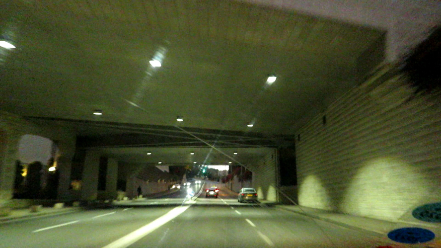 LED lighting at the tunnel below the pedestrian bridge
These LED fixtures replaced HID fixtures which originally had SON lamps but has been replaced with MH lamps.
This lighting don't operates during the day, which isn't good, as it is a tunnel.
This is a video capture, since I can't capture a good quality picture of this because there were twilight.
