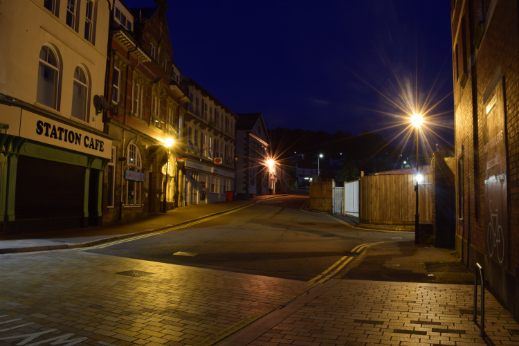 Sodium street 
A rare sight nowadays,  two DWW lanterns on the left (theres 4 but only 2 working) and a Thorn version on the Right. 
Sadly the DWWs have been replaced with Grey Aspect Minis, which look silly on these columns.  The Thorn one is still there but not working. 
